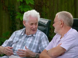 John Carroll (left)