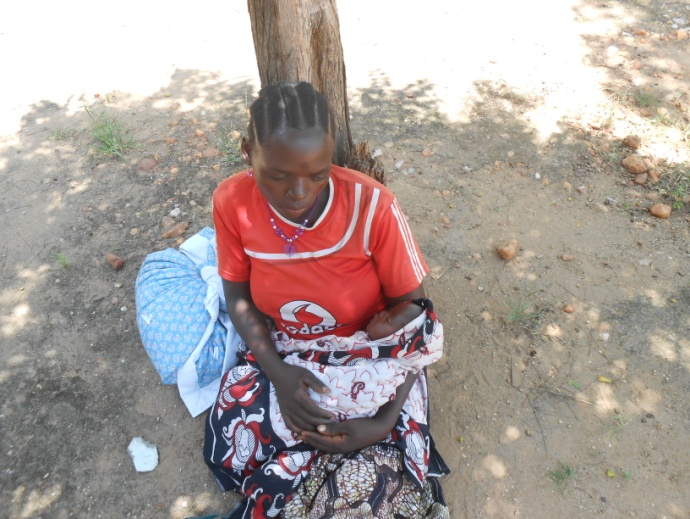 Baby Amina and her mother were rescued from the flood by helicopter